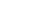 Granular carbon char falling into a small pile, representing circular bioeconomy materials and sustainable resource use